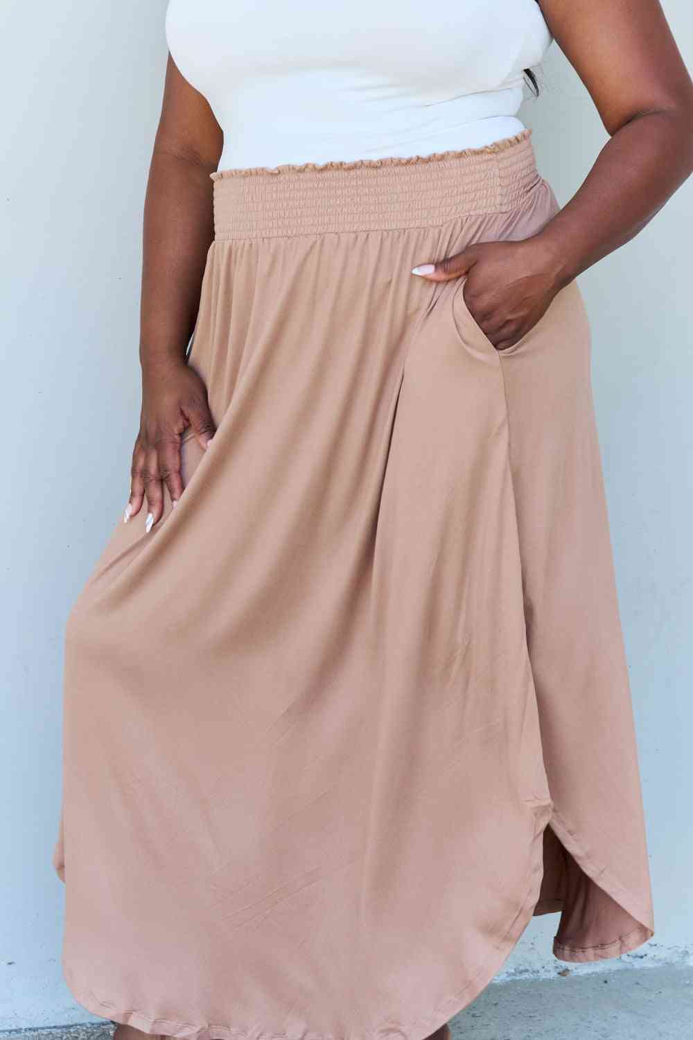 Plus-size High Waist Scoop Hem Maxi Skirt in Tan